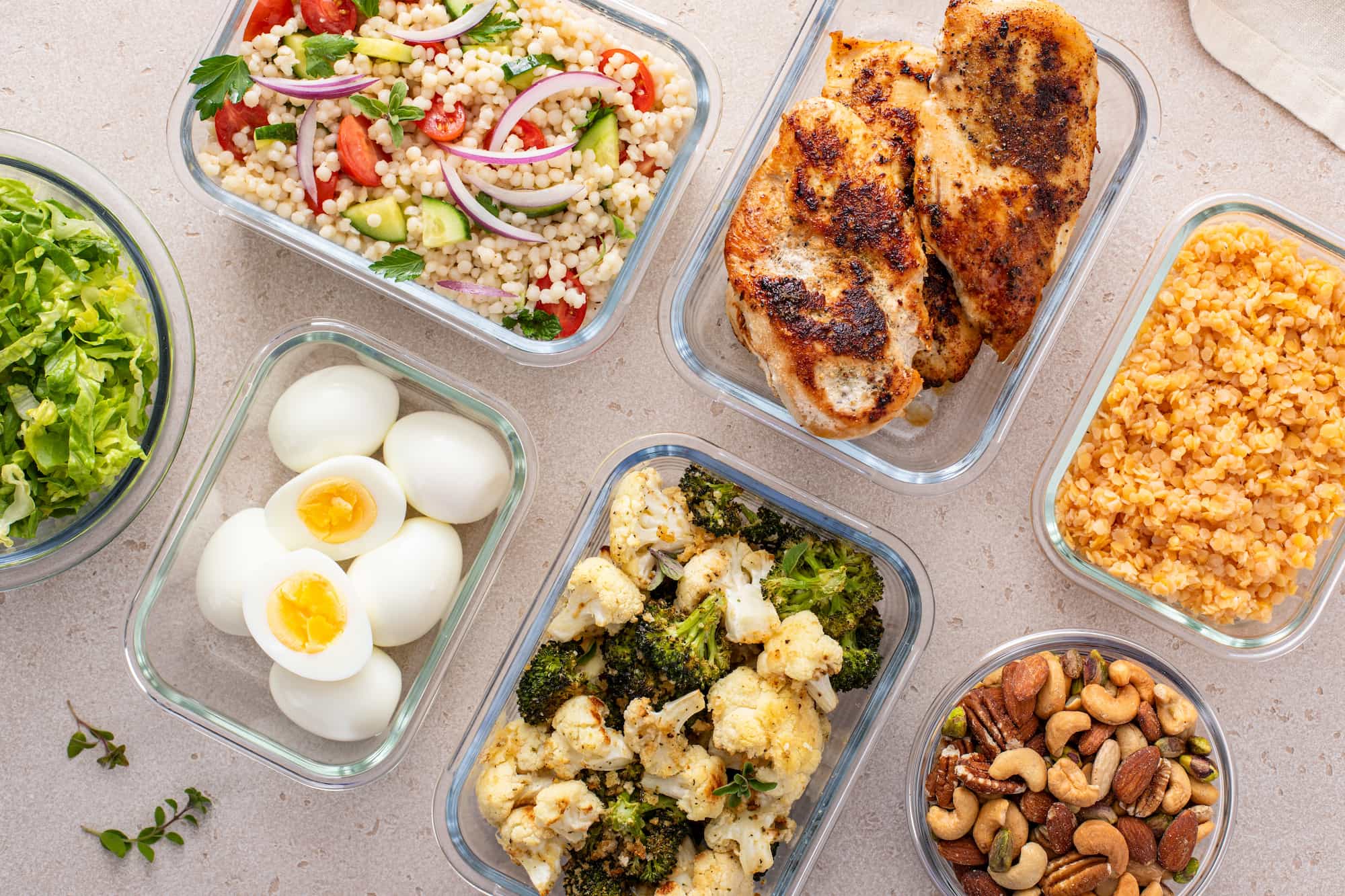 numerous healthy and easy food to make in glass containers for meal prep
